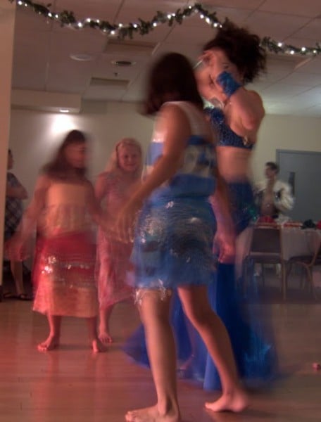 Alia dancing with the children. Photo by Raymond Romanos